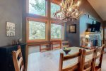 Formal dining area set for eight